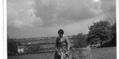 Jill Vallis with two baby calves c1960