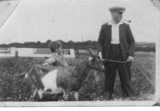 Ken Robinson with uncle and goat 1937