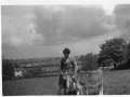 Jill Vallis with two baby calves c1960