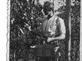 Danny Robinson picking tomatoes c1940