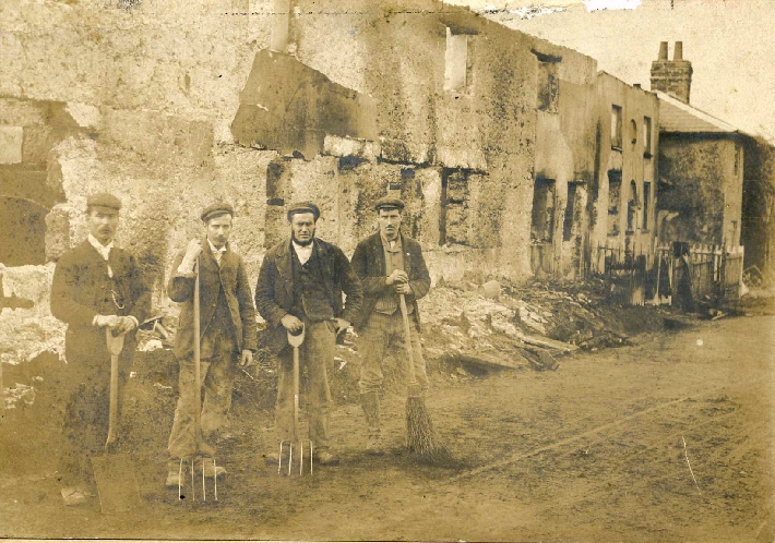 Clearing up after the Abbotts Ann School fire Nov 1899
