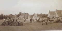 Working on the Village Sports field after it was donated to the Village