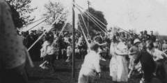 The Maypole dance at The War Memorial Hall on the occasion of King George V. Silver Jubilee.