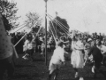 The Maypole dance at The War Memorial Hall on the occasion of King George V. Silver Jubilee.