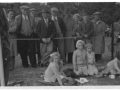Group of adults and children c1955