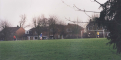 AAPC-6-1-037 -- village green -- football on the Sportsfield looking south -- 2000