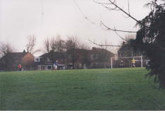 AAPC-6-1-037 -- village green -- football on the Sportsfield looking south -- 2000
