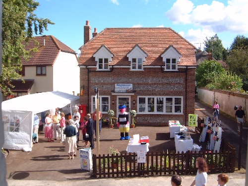 Front of the new Village Shop being prepared for the big Day