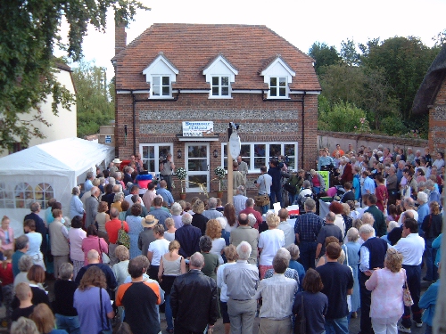 The start of the formal opening of the Village Post Office