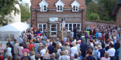 The start of the formal opening of the Village Post Office
