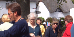 Villagers departing from the shop to the fete in Duck Street